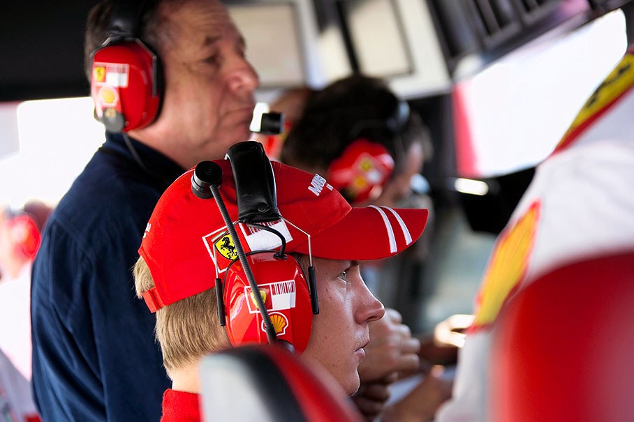 Kimi Raikkonen with Ferrari team principal Jean Todt at pit wall during a pause on Friday afternoon, the car is experiencing a minor hydraulics problem