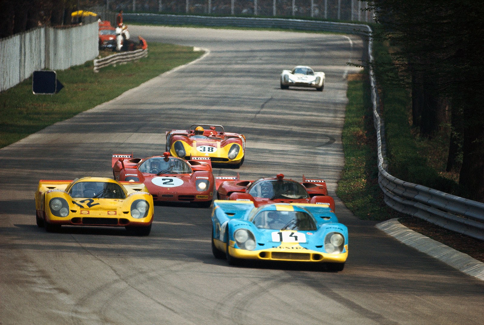 Car number 12 with Hans Laine (SF) and Gijs van Lennep (NL) in a Porsche 917K #021 entered by Racing Team AAW close behind queue leader car number 14 with Jurgen Neuhaus (D) and Helmut Kelleners (D) in a Porsche 917K #007 entered by Gesipa Racing Team