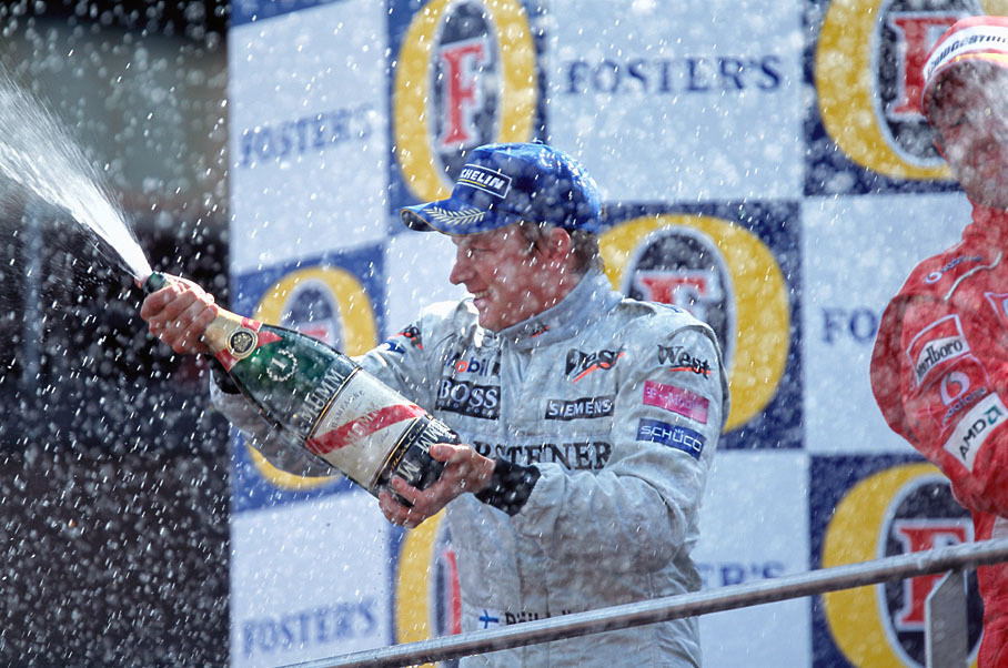 Kimi Raikkonen shares his champagne shower
