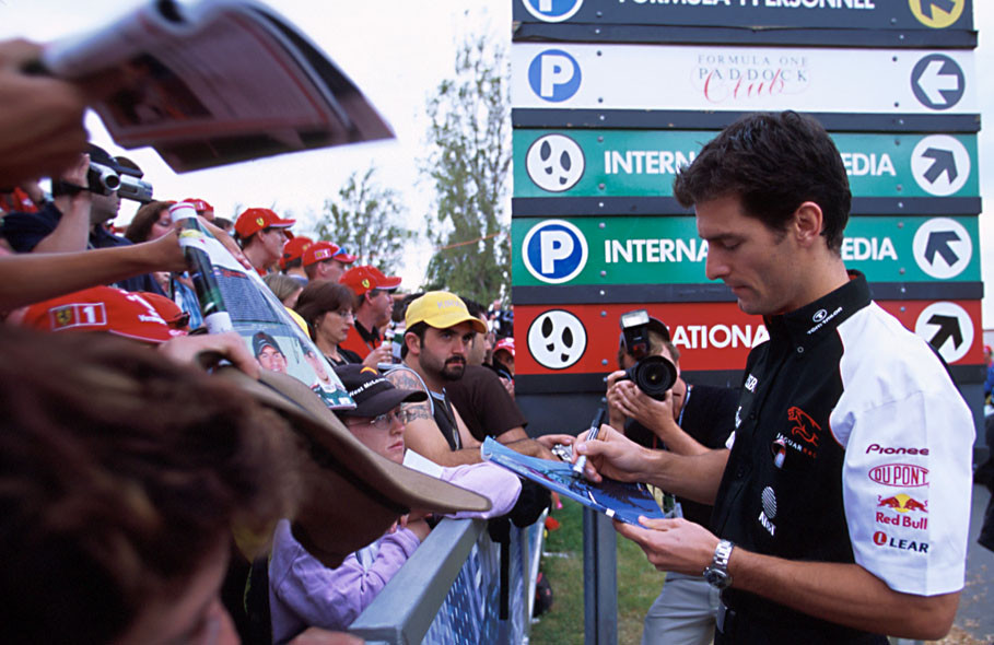 Mark Webber autographing at his home GP