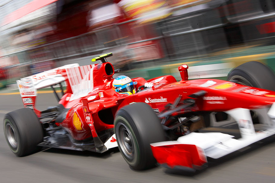 Fernando Alonso, Ferrari, drives out of the pits