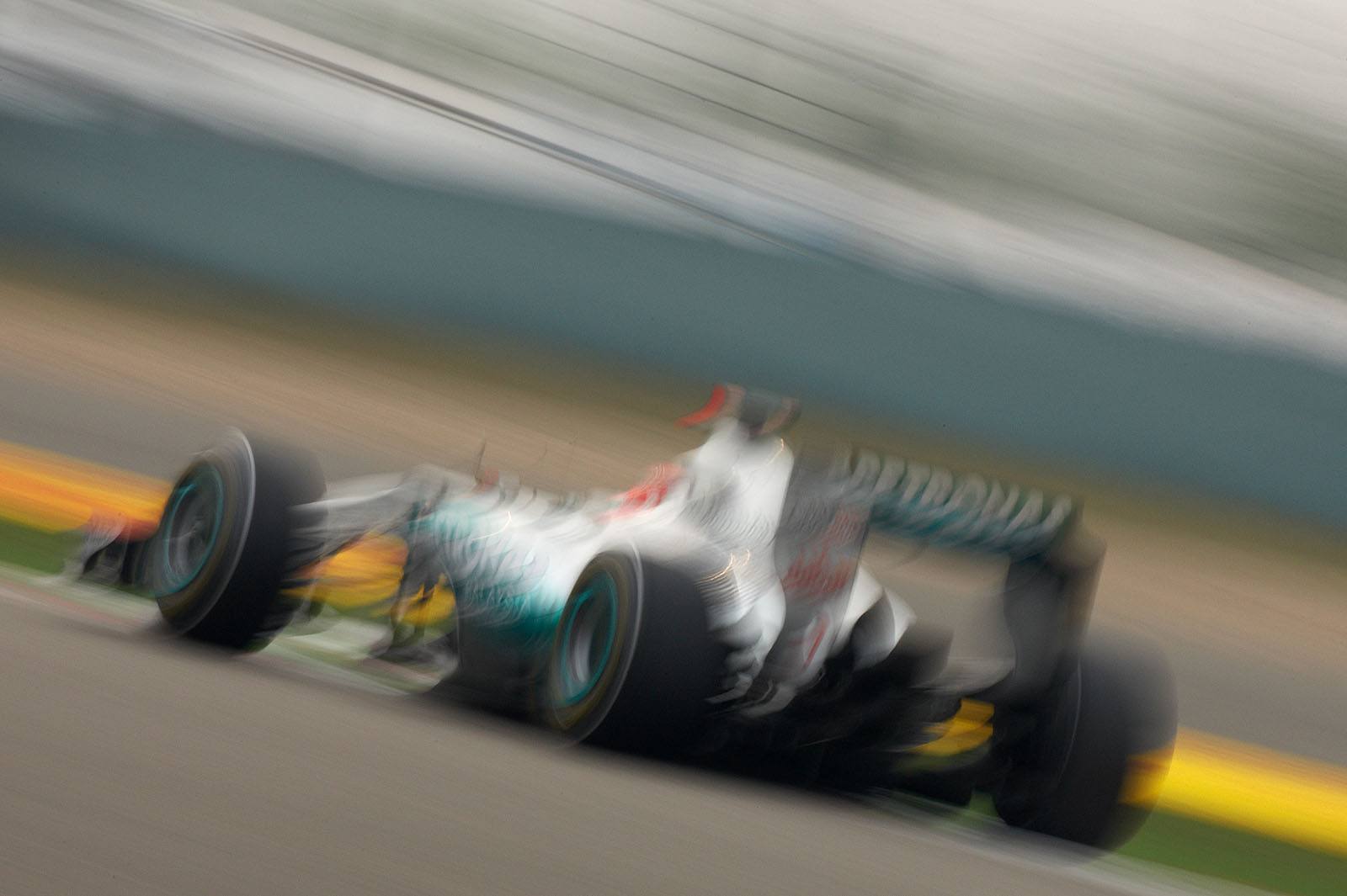 A motion shot of Michael Schumacher, Mercedes GP