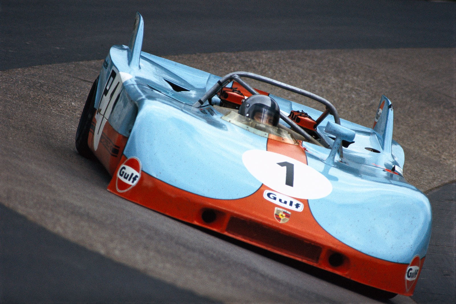 Pedro Rodriguez (MEX) scratches the banking with the edge of the Porsche 908/03 013 entered by J. W. Automotive Gulf Porsche