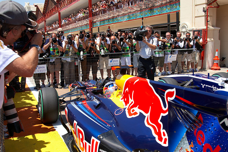 Polesetter Sebastian Vettel, Red Bull Racing, arrives at the fenced parc ferme