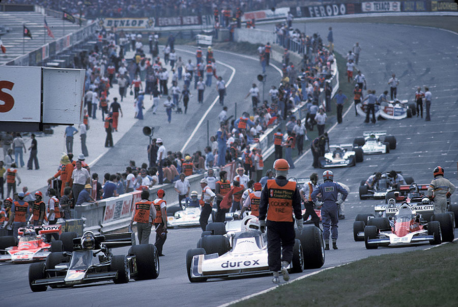Cars are prepared for a restart following a crash