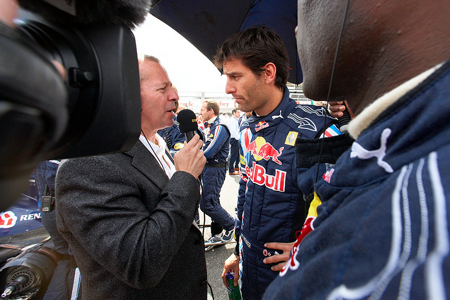 Third grid placed Mark Webber is being interviewed by Martin Brundle before the race