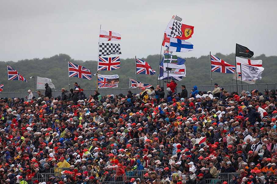 Fan flags and Union Jacks on fishing poles