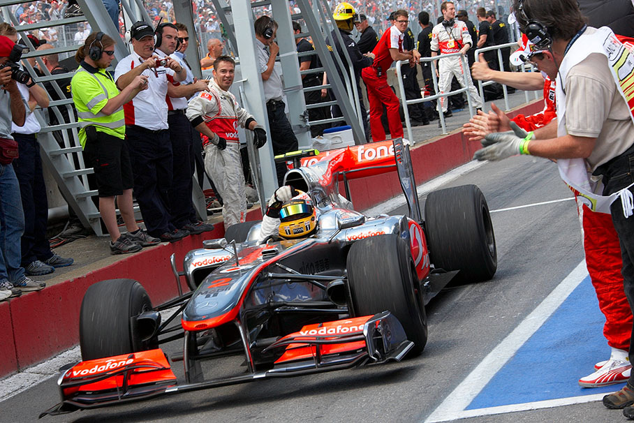 Race winner Lewis Hamilton arrives in parc ferme after the race