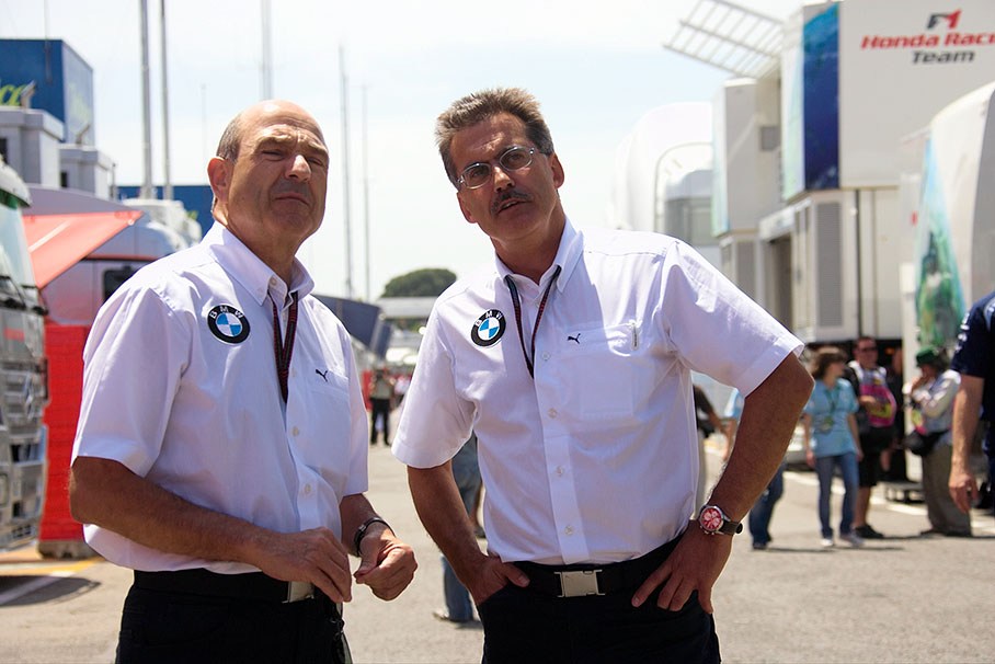 Peter Sauber and Mario Theissen of BMW probably admire Ferrari's new media motorhome