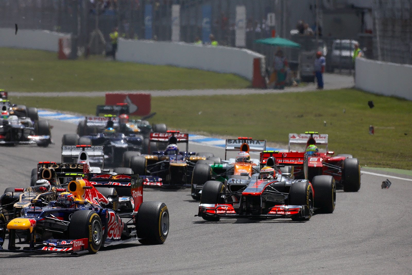 The start goes through a debris-polluted turn one