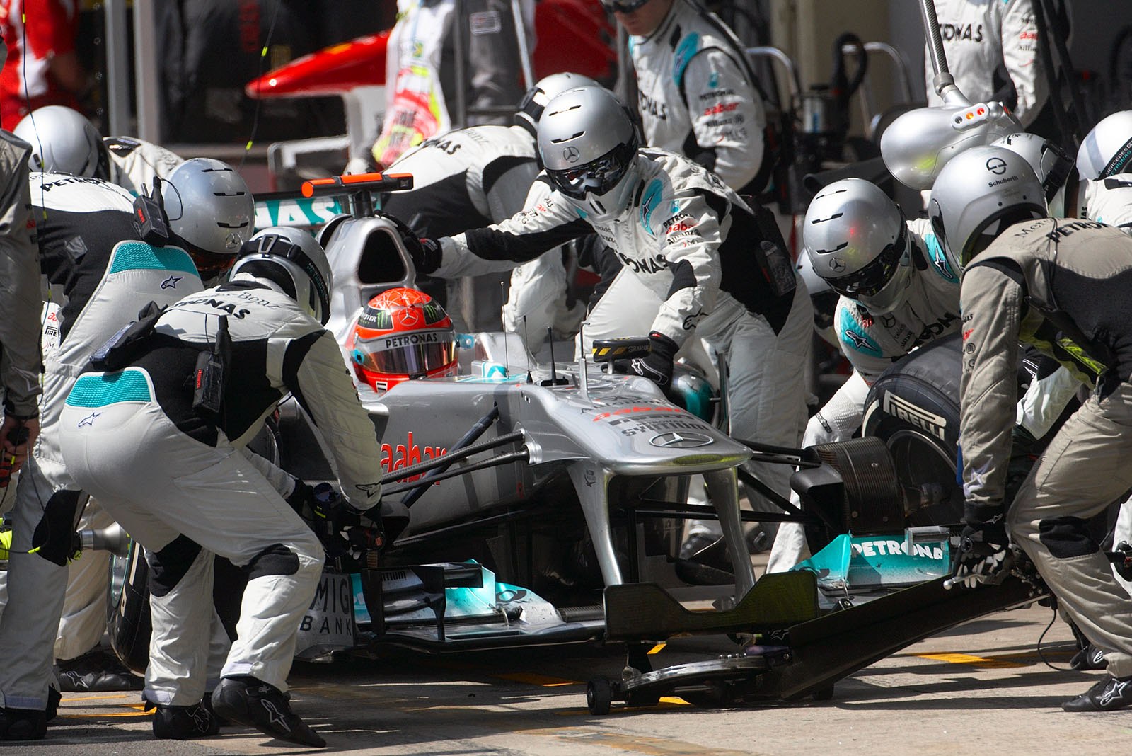 Michael Schumacher stops at Mercedes GP pits