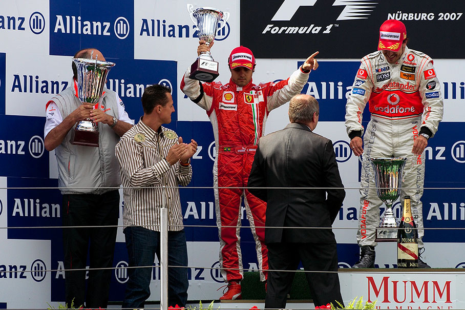 Second placed Massa presents his booby prize ;)