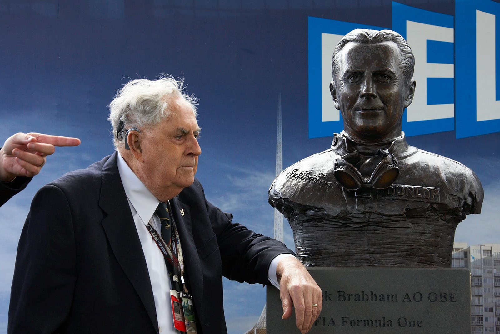 Australian racing legend Sir Jack Brabham with the statue unveiled in his honour