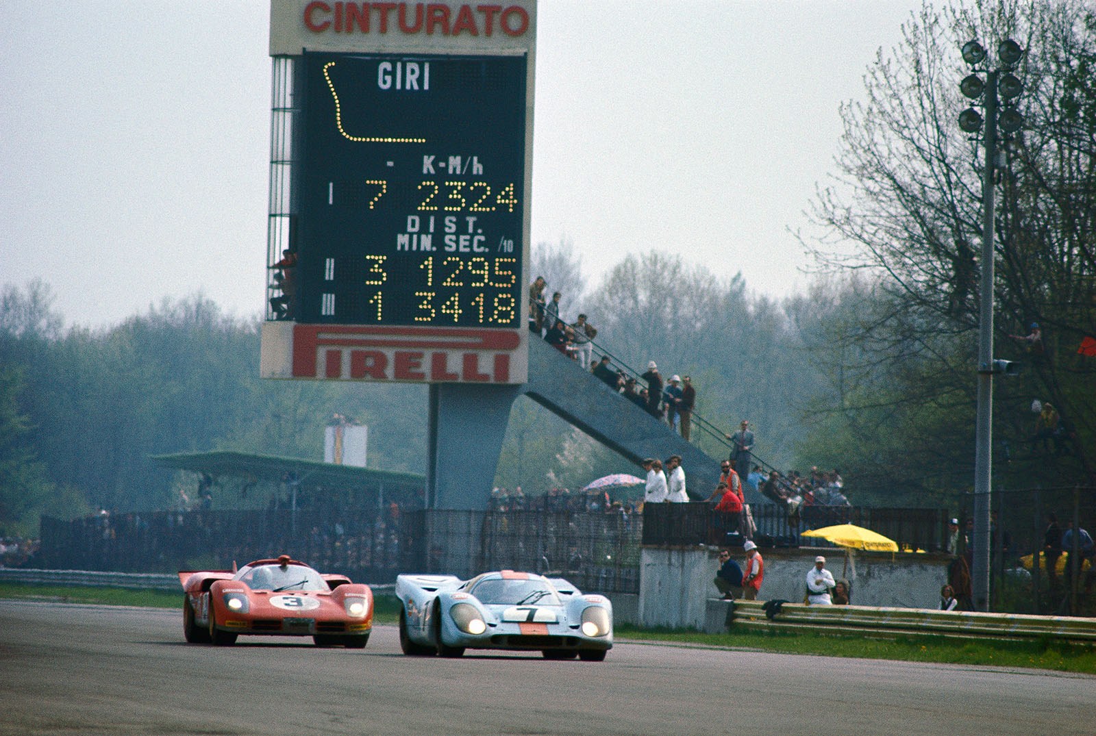 The winning Porsche 917K 016 driven by Pedro Rodriguez (MEX) and Leo Kinnunen (SF) in front of second placed Ferrari 512 S Spyder #1042 of Ignazio Giunti (I) and Nino Vaccarella (I)