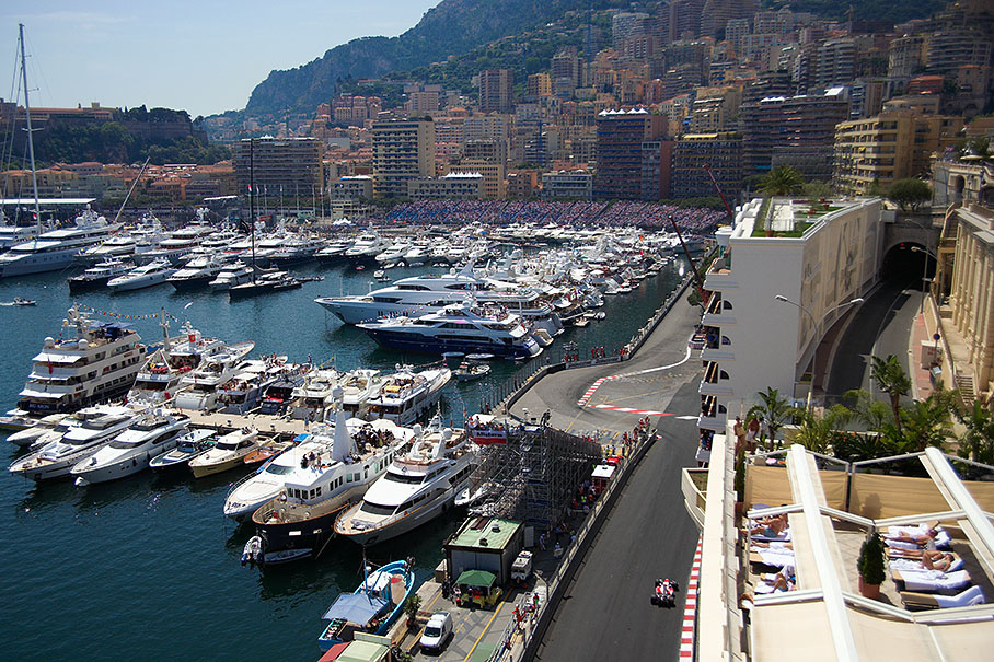 A lonely Toyota enters a panoramic Monaco scenery