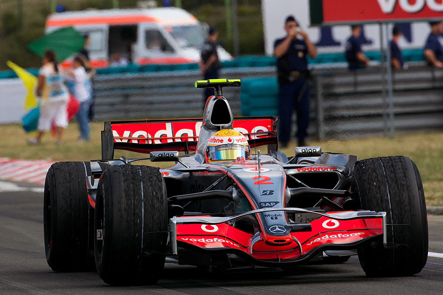 Lewis Hamilton drives to parc ferme