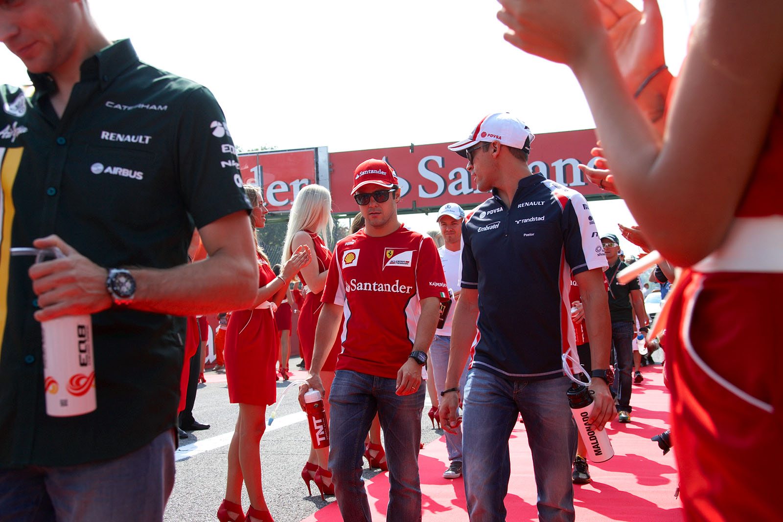 The race drivers walk to the drivers parade - Felipe Massa and Pastor Maldonado