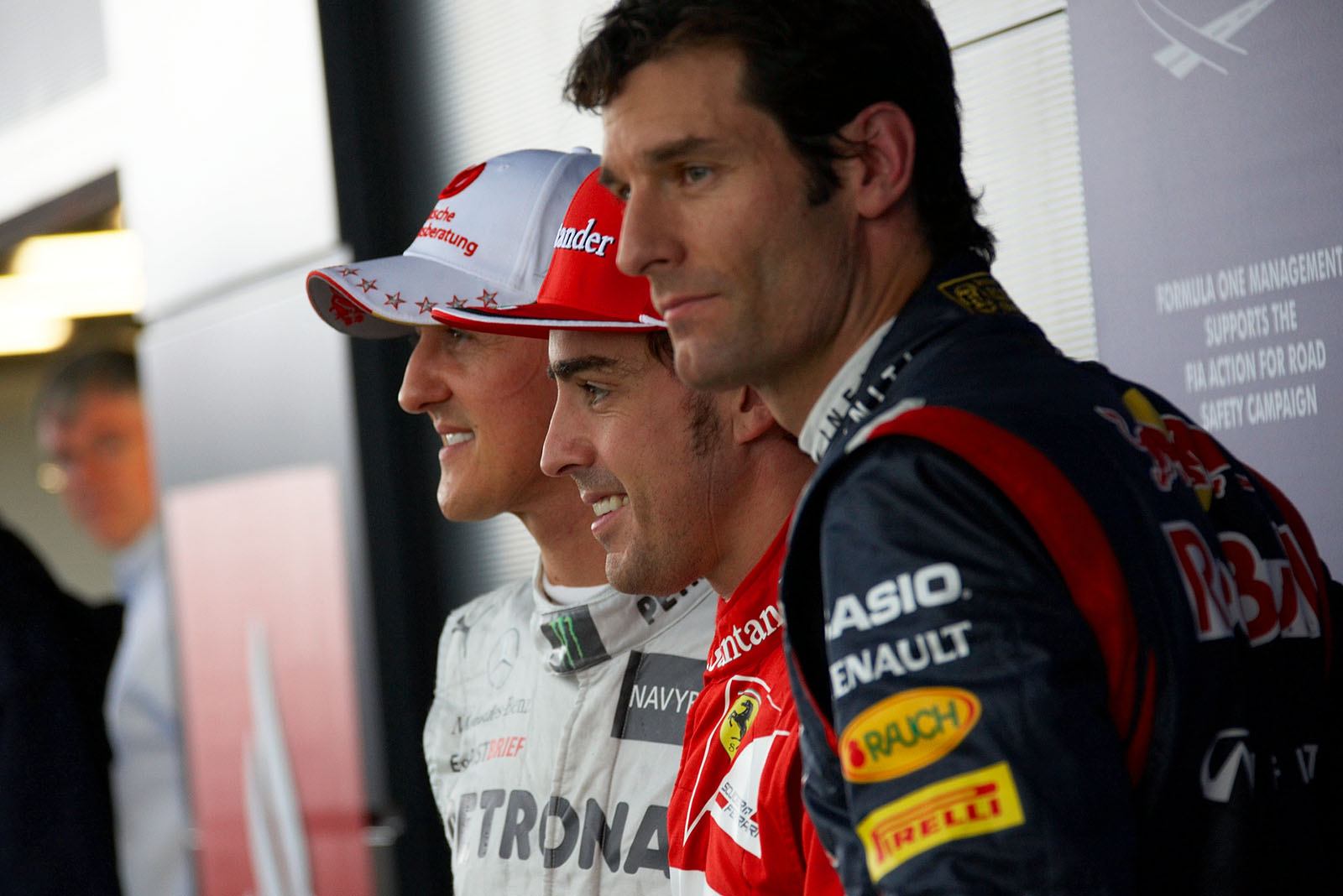 The fastest three runners line up after the qualifying's rainy prolongation