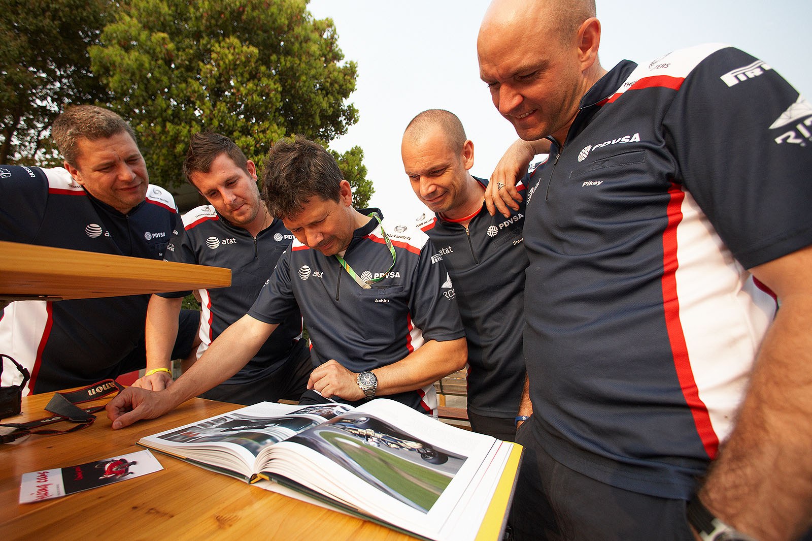 The Williams team admires Rainer's new Lotus book (see http://www.edel.com/de/buch/releases/details/artist-discography//rainer-schlegelmilch/team-lotus-in-formula-1/)