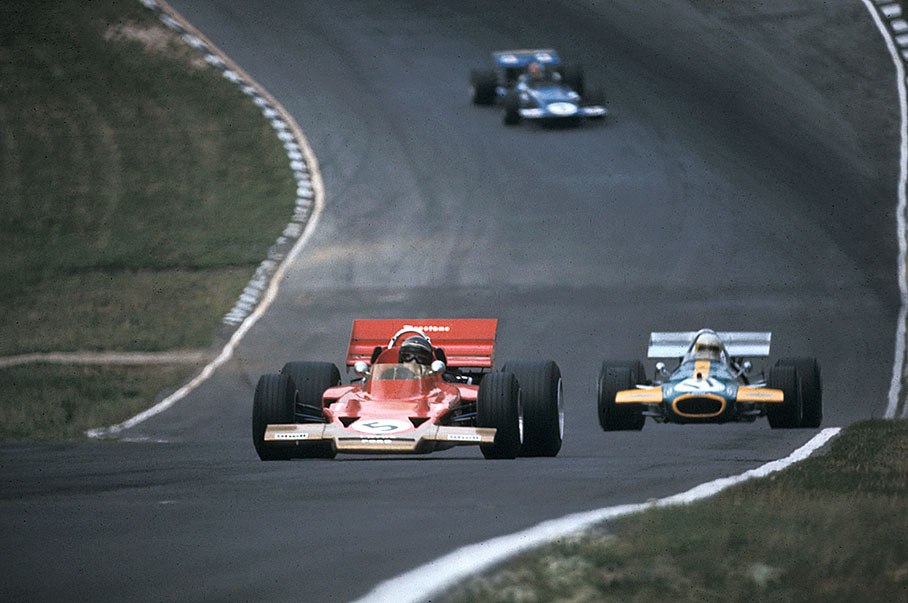 Winner of the British GP Jochen Rindt on Lotus-Cosworth 72C in front of pursuer Jack Brabham