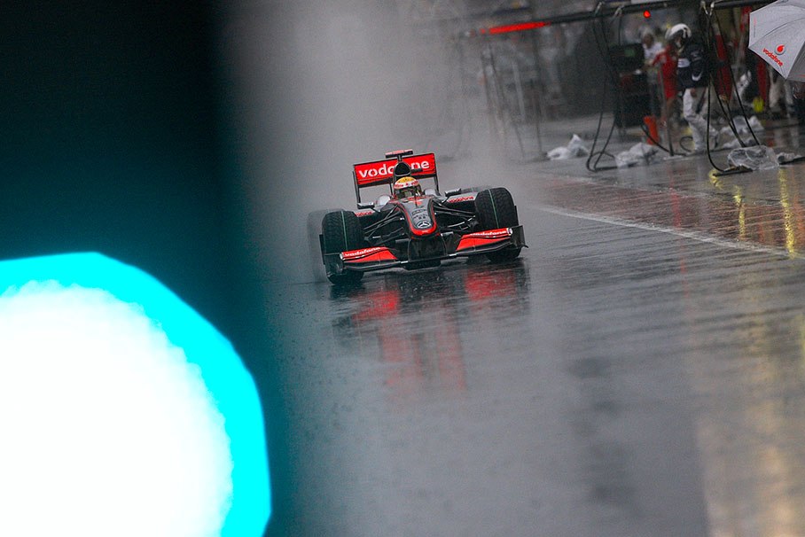Lewis Hamilton, McLaren Mercedes, passes the green pitlane signal