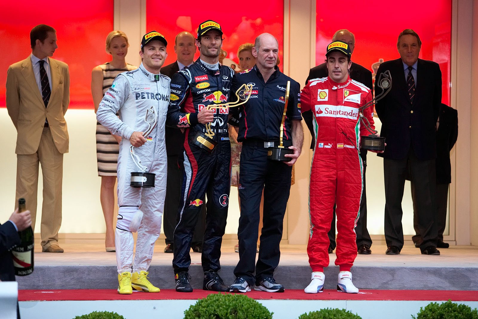 Podium group photo after the ceremony of second placed Nico Rosberg, race winner Mark Webber, Red Bull's Adrian Newey and third placed Fernando Alonso