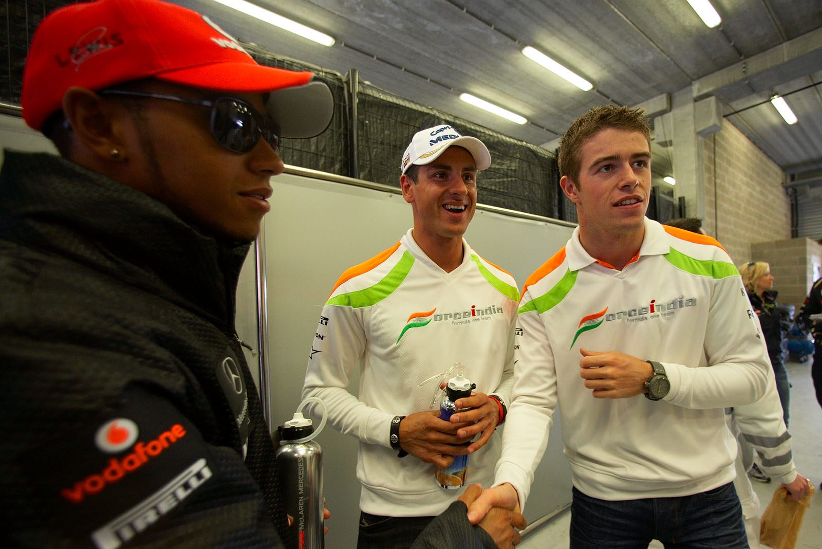 Race drivers chat before the parade on Sunday - Lewis Hamilton with sunglasses, Force India drivers Adrian Sutil and Paul di Resta