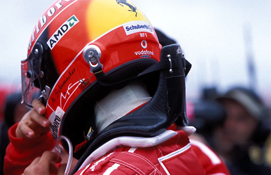 A close-up of HANS device at the Champion's neck