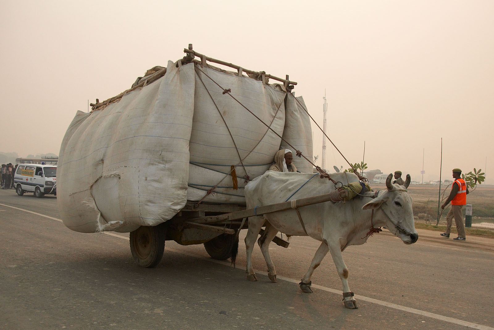 A typical local transportation vehicle on its dusty way to the recently built race track