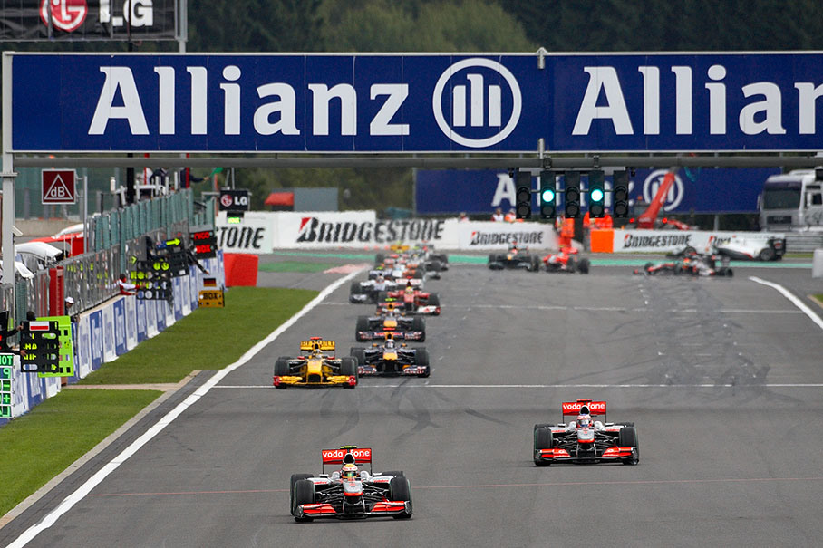 Track cleared after four laps, the two McLarens in the lead