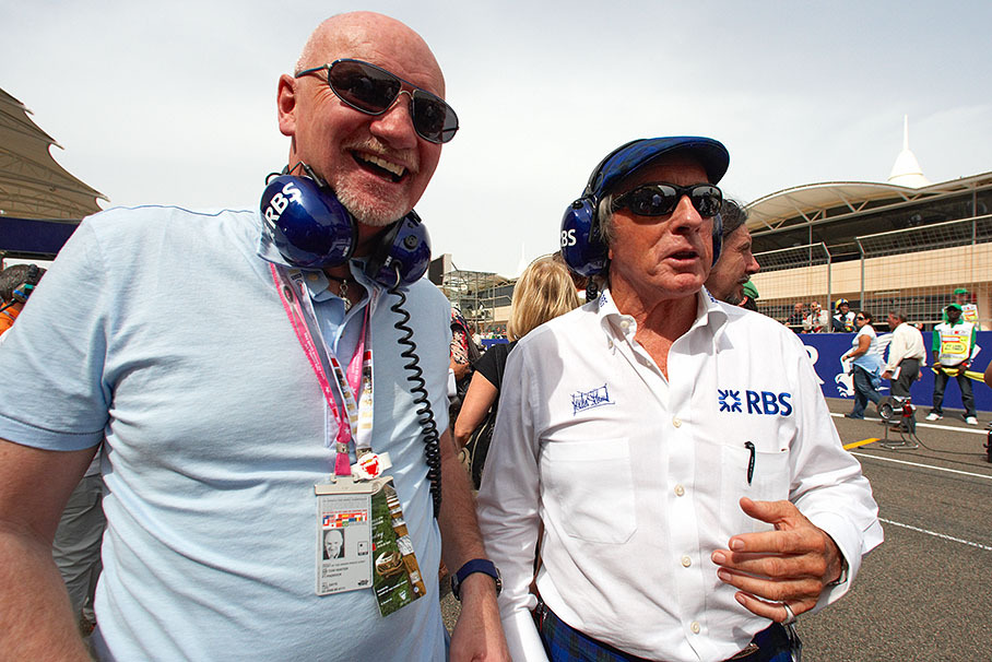 Sir Jackie Stewart on grid sightseeing with Williams VIP guest and 'richest Scot' Sir Tom Hunter