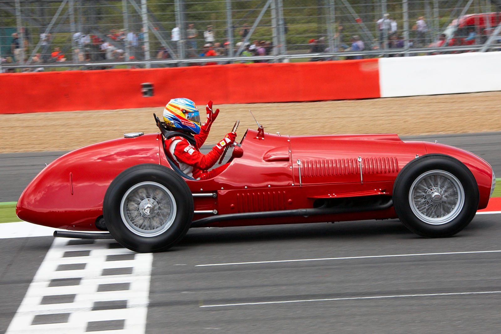 As part of the F1 60th annual celebration, Ferrari driver Fernando Alonso drives two laps in Froilan Gonzalez's Ferrari 357 F1 which scores the first victory for Ferrari in Silverstone 1951