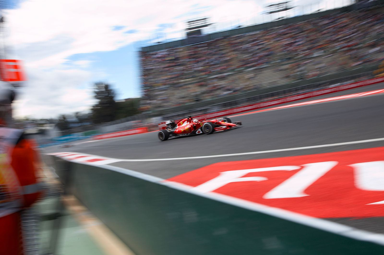Sebastian Vettel, Ferrari, into turn 13, Mexican Grand Prix, 2015