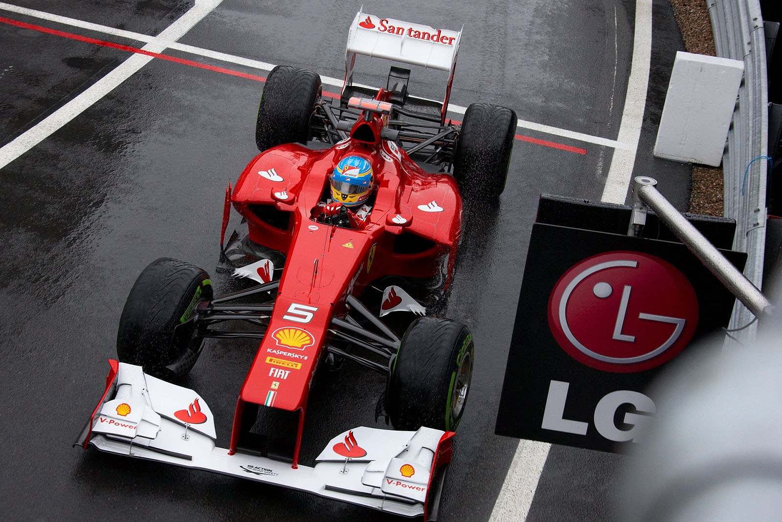 Fernando Alonso, Ferrari, at pit lane exit