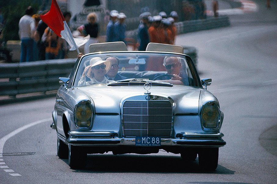 Princess Gracia Patricia and Prince Rainier de Monaco drive a lap of honour before the start of the Grand Prix race