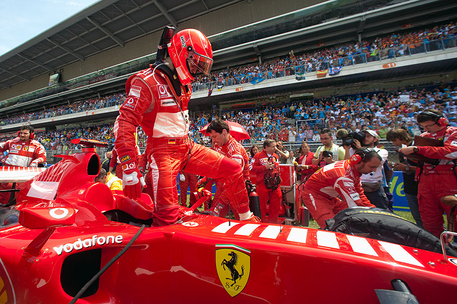 Michael Schumacher dismounting his company car