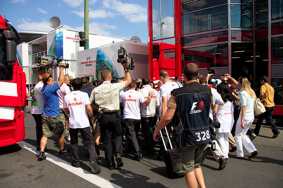 Media overwhelms McLaren the drivers on Sunday morning after the FIA's decision to put Hamilton on pole position and punish Alonso with 6th grid place