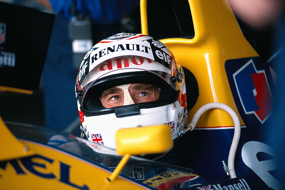 Nigel Mansell sitting in his Williams-Renault in the pits