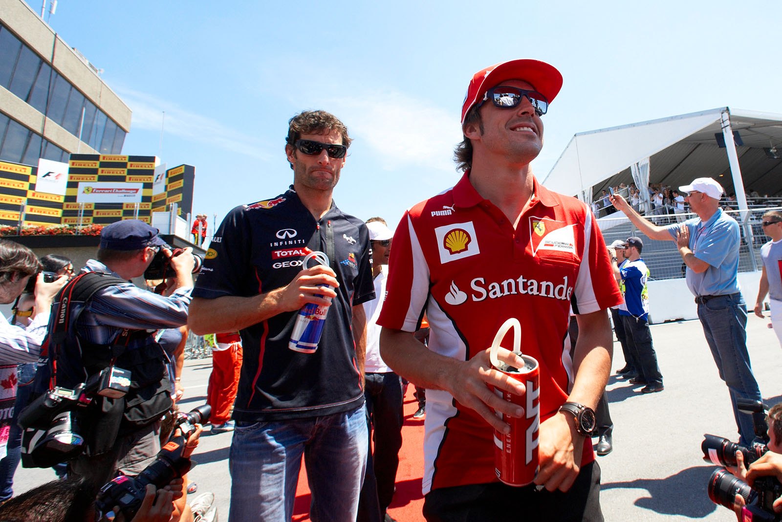 Fernando Alonso, Ferrari, and Mark Webber, Red Bull Racing, walk to the drivers parade