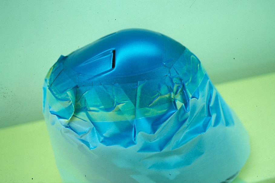 Peter Ginneken of BELL Helmets S.A. making the artwork of the 1998 Suzuka race helmet for Michael Schumacher