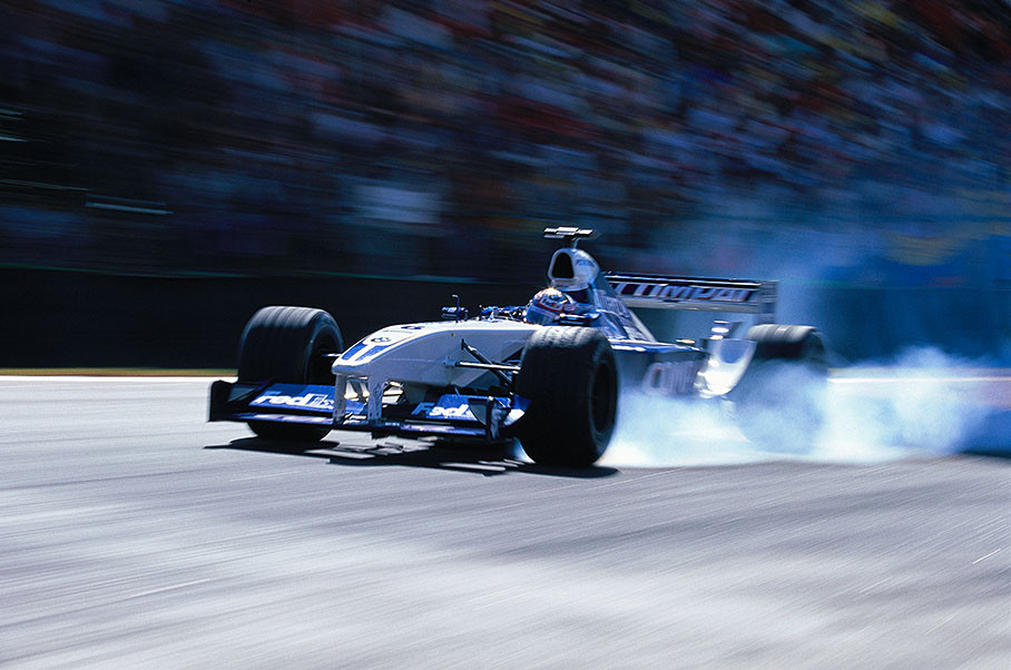 Juan Pablo Montoya burning some rubber