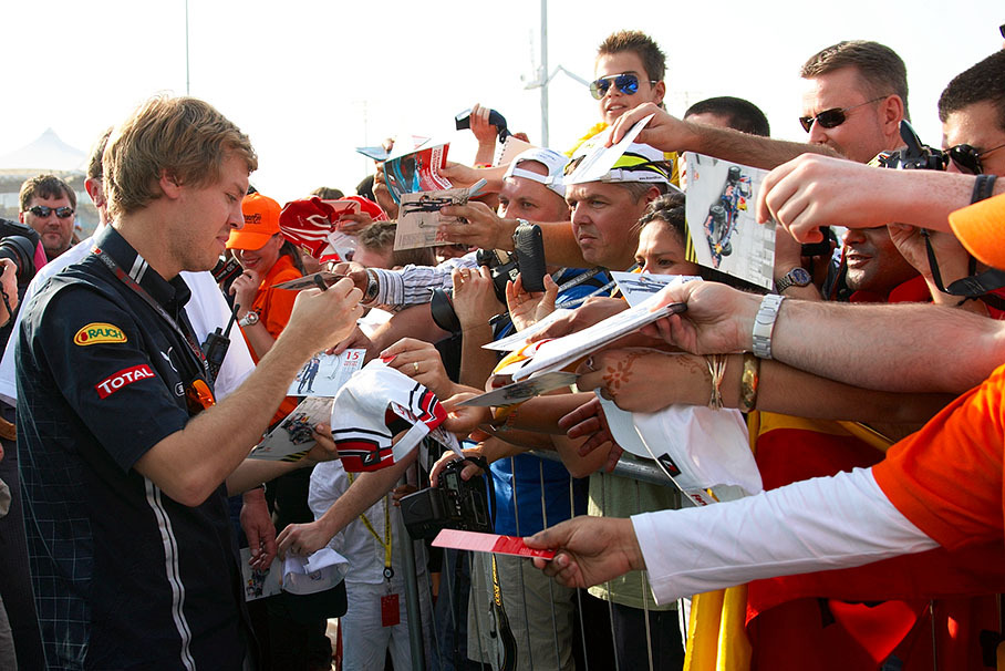 Everrybody wants a signature from Red Bull's Sebastian Vettel