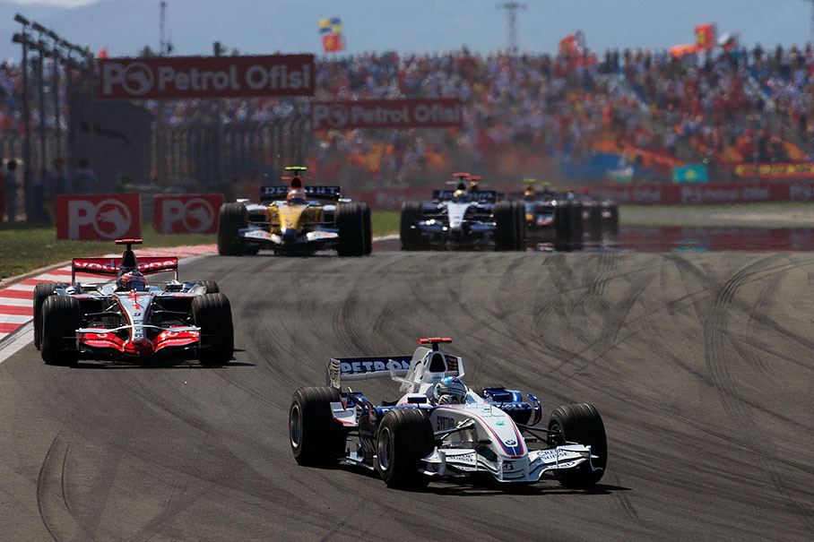 Heidfeld in front of Alonso