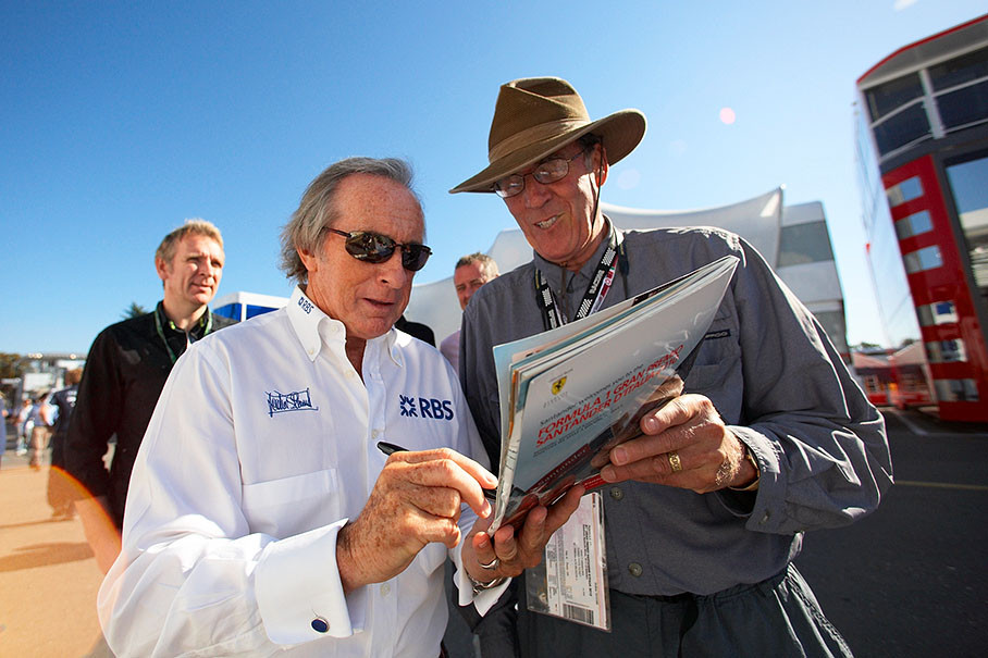 Triple F1 World Champion Sir Jackie Stewart (1969, 1971 and 1973) signs an autograph