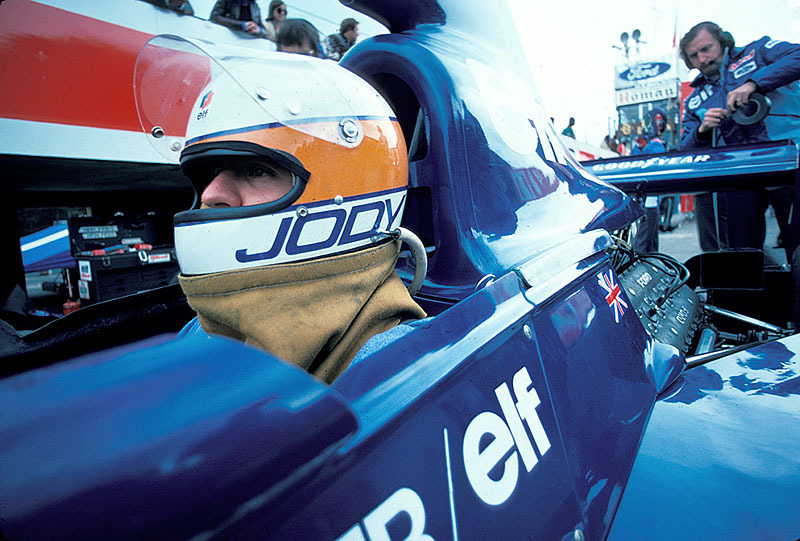The later second placed Jody Scheckter is concentrating whilst Derek Gardner uses tape on the Tyrrell-Cosworth 007, Belgian GP Zolder 1975