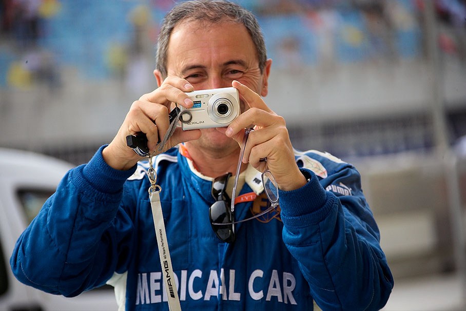 FIA Deputy Director of Medical Affairs Dr. Jacques Tropenat takes a souvenir photo