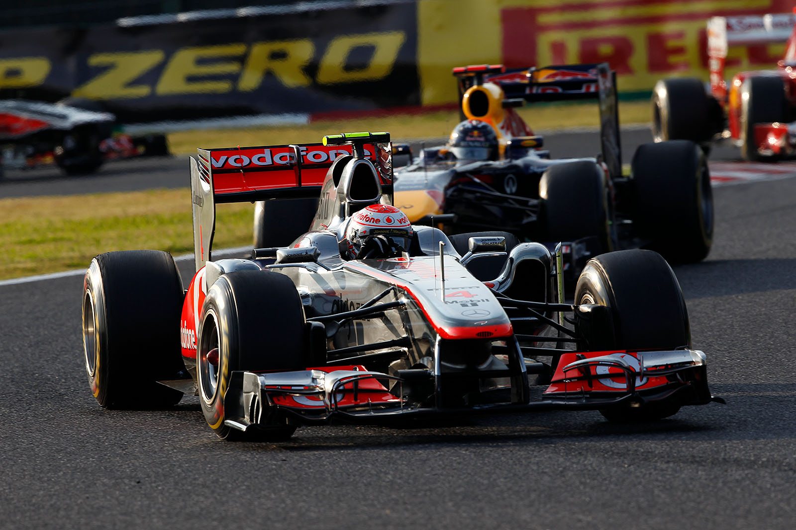 Jenson Button, McLaren Mercedes, leads the race during a safety car phase