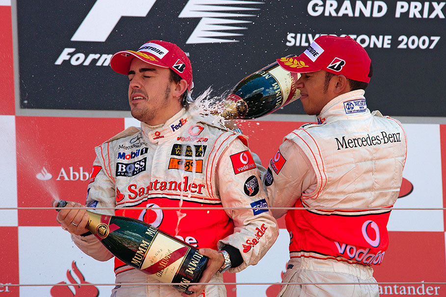McLaren champagne party between second placed Alonso and third Hamilton