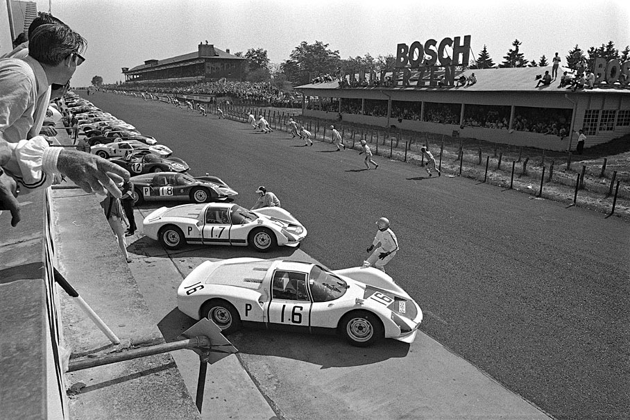 The two works Porsche 906s, 6th and 7th in the line-up, of Udo Schuetz (No. 16) and Bob Bondurant (No. 17), who decided they could not wait for the rest.