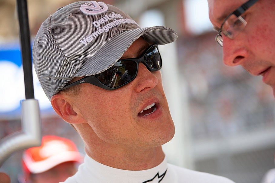 Michael Schumacher speaks with his race enginer Andrew Shovlin